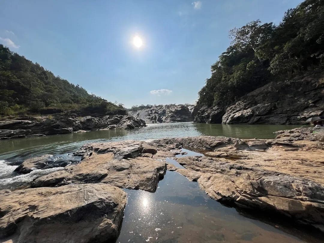 Perwaghagh Waterfall — curtain waterfall with rock overhang cave through sal forest, Khunti district, Jharkhand