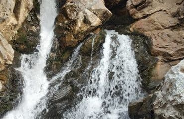 Tamasin Waterfall — multi-tier cascade in sal forest with wide pool at base, Chatra district, Jharkhand